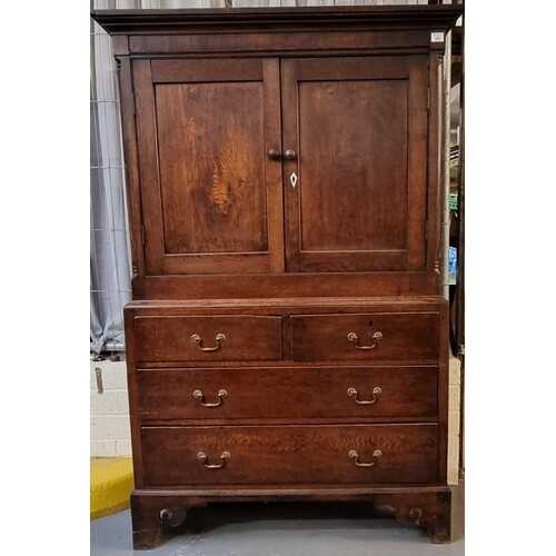 19th Century Welsh oak two stage press cupboard, the moulded...