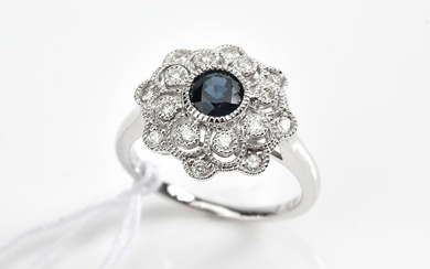 A SAPPHIRE AND DIAMOND RING IN 18CT WHITE GOLD, SAPPHIRE OF 0.75CTS, APPROXIMATE TOTAL DIAMOND WEIGHT 0.26CTS