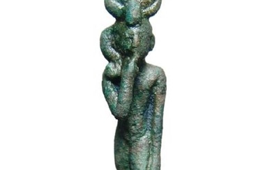 An Egyptian bronze figure of a striding Harpokrates