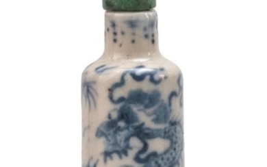 MINIATURE CHINESE BLUE AND WHITE PORCELAIN SNUFF BOTTLE In cylindrical form, with five-claw dragon design. Height 2". Rubolite stopper.