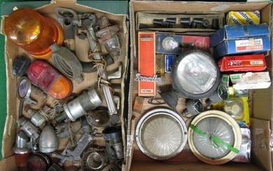 Two boxes of vehicle parts to include: gauges, lights, boxed items, roof lights etc together with a Swallow badge