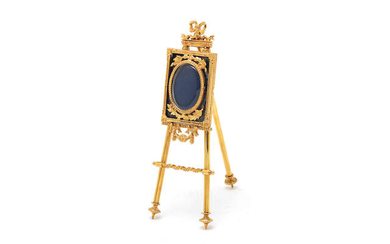 A 9 carat gold photo stand