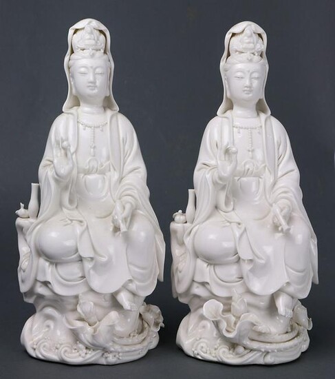 (lot of 2) A pair of seated Dehua Guanyin figures