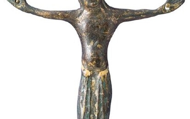 Gilded copper Christ figure with champlevé enamel.