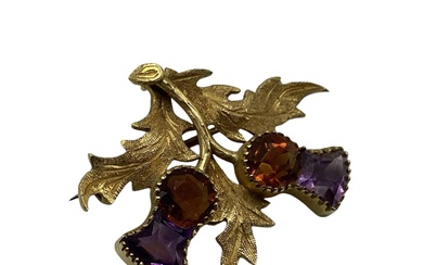 A 15ct gold citrine and amethyst thistle brooch, 4.35...