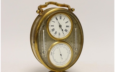 A 19th century gilt metal timepiece barometer with thermomet...