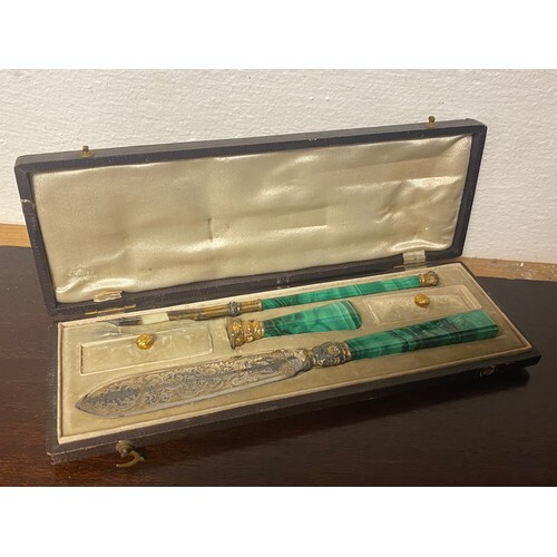 A 19th century malachite and gilt desk set, the fitted case ...