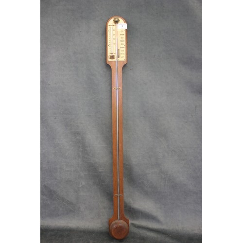 A 20th century mahogany stick barometer of 19th century styl...