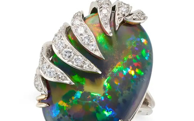 A BLACK OPAL AND DIAMOND RING set with a cabochon ...