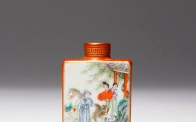 A CHINESE FAMILLE ROSE IRON-RED GROUND SNUFF BOTTLE 19TH CENTURY...