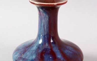 A CHINESE FLAMBE PORCELAIN VASE, with a graduated red