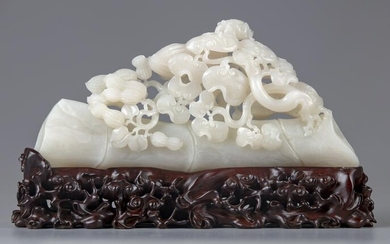 A CHINESE PALE JADE CARVING OF BAMBOO AND PEANUTS