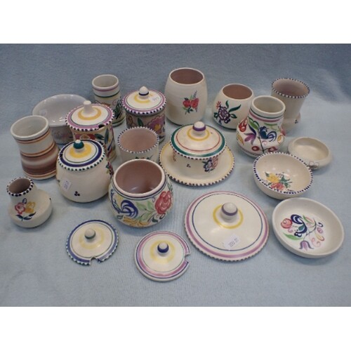 A COLLECTION OF POOLE POTTERY ITEMS including odd lids