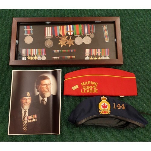 A COLLECTION OF WWII MEDALS - IN A PRESENTATION CASE - INCL ...