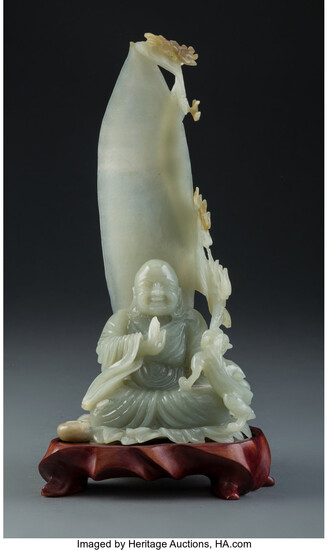 A Chinese Carved Pale Celadon Buddha-Figure with Hardwood Stand