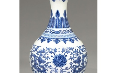 A Chinese blue and white vase, 19th c, the ovoid body tapere...