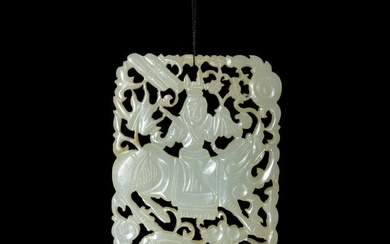 A Chinese carved jade 'qilin' and 'boy' plaque, 19th century