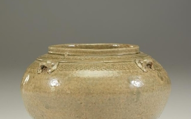 A Chinese celadon-glazed stoneware small jar, Eastern