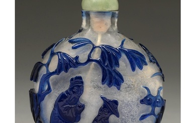 A Chinese glass snuff bottle, 20th c, of semi transparent cl...