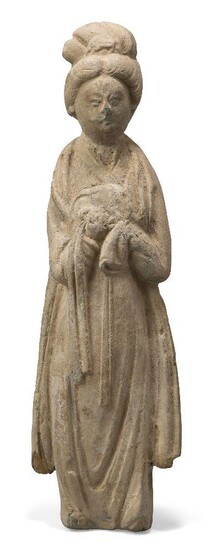 A Chinese pottery/composite figure of a lady, Tang dynasty style, modelled standing with hands clasped in long flowing robes, the figure 42cm high