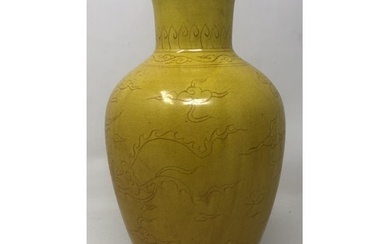 A Chinese yellow ground vase, decorated dragon, six characte...