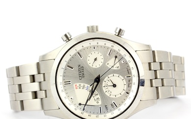 A Citizen Watch co Exceed stainless steel wristwatch (model no. 6760-H26019 TA, 050045, GN-4-S 12) on a stainless steel strap.