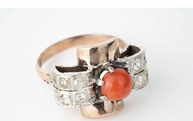 A Coral and Diamond Ring A round coral stone to centre, ...