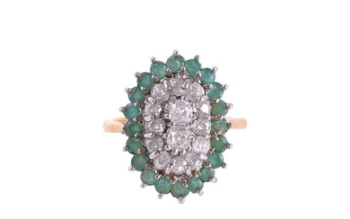 A DIAMOND AND EMERALD CLUSTER RING