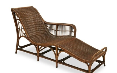 A Dryad cane chaise lounge