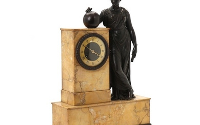 A French patinated bronze and Sienna marble figural mantel clock. C. 1820. H. 56 cm. W. 37 cm. D. 15 cm.