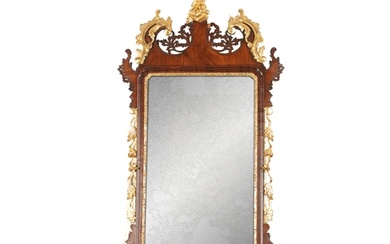 A GOOD GEORGE III MAHOGANY AND PARCEL GILT HANGING MIRROR wi...