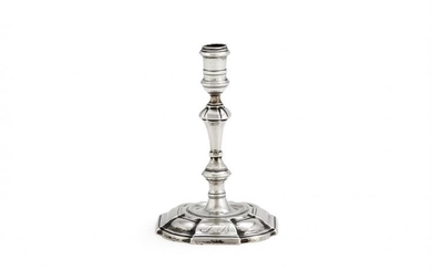 A George II cast silver taperstick by James Gould