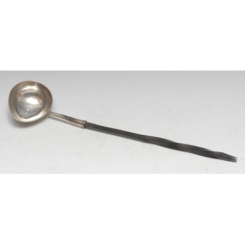 A George II silver punch ladle, boat shaped bowl, twisted wh...