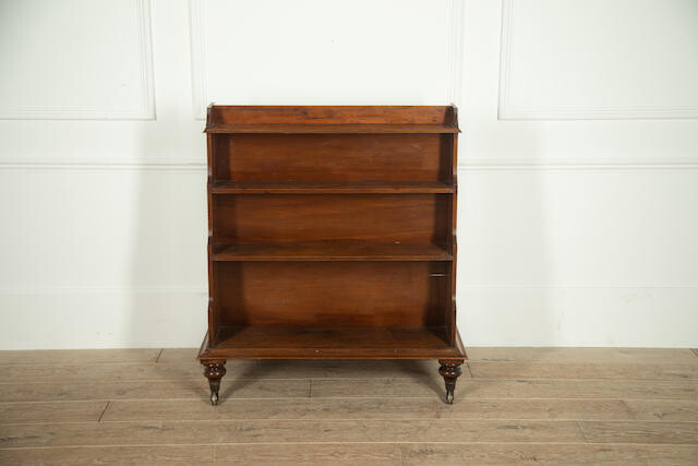 A George IV mahogany double sided waterfall bookcase