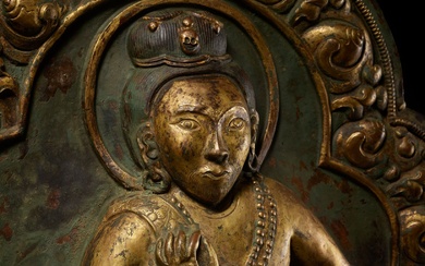 A LARGE PARCEL-GILT COPPER REPOUSSÉ PLAQUE DEPICTING THE MAHASIDDHA NAROPA, TIBET, 18TH - 19TH CENTURY