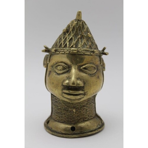 A LATE 19TH CENTURY WEST AFRICAN BRASS ALLOY CASTING OF A HE...