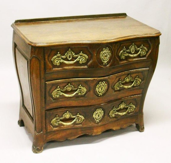 A LOUIS XV STYLE FRENCH OAK SERPENTINE FRONT COMMODE