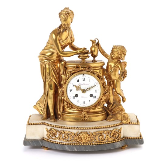 A Louis XVI gilt bronze and white marble figural striking mantel clock. Signed 'Balthazar a Paris'. C. 1770. H. 42 cm. W. 35 cm. D. 16 cm.