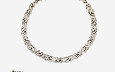 A Matching Set of 14K White Gold and Diamond Necklace and Bracelet