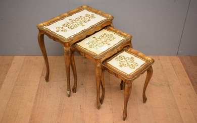 A NEST OF THREE 1900S ITALIAN FLORENTINE GILTWOOD TABLES WITH CREAM DETAILLING (LARGEST 57H x 57W x 37D CM) (LEONARD JOEL DELIVERY S...