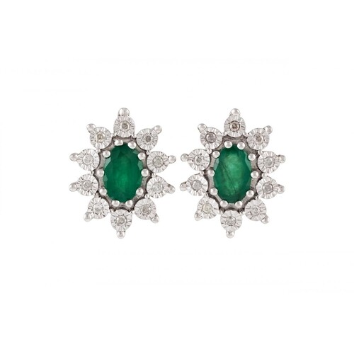 A PAIR OF DIAMOND AND EMERALD CLUSTER EARRINGS, of oval form...