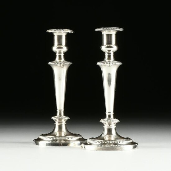 A PAIR OF GEORGE III STYLE SILVER PLATED CANDLESTICKS