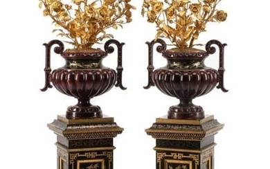 A Pair of French Enameled Cast Iron and Gilt Bronze Candelabra with Associated Painted Pedestals