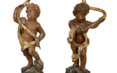 A Pair of Italian Painted and Parcel Gilt Figural Torcheres