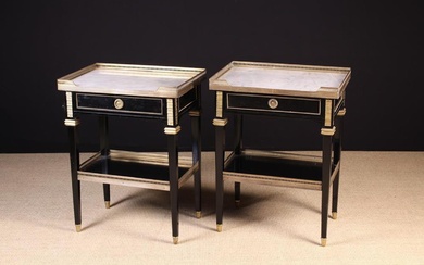 A Pair of Louis XVI Style Tables Ambulant. The rectangular grey veined white marble tops having pier