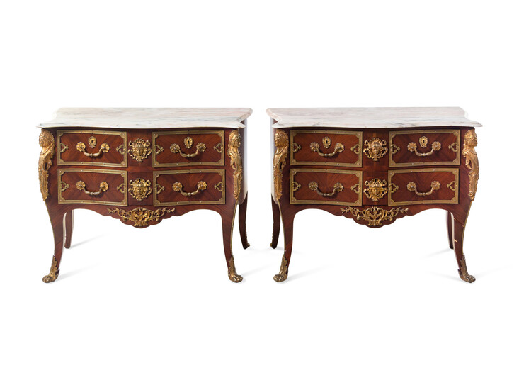A Pair of Régence Style Gilt Bronze Mounted Marble-Top Commodes