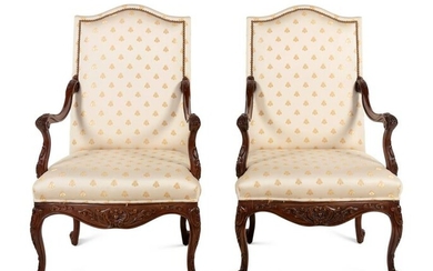 A Pair of Regence Style Walnut Armchairs