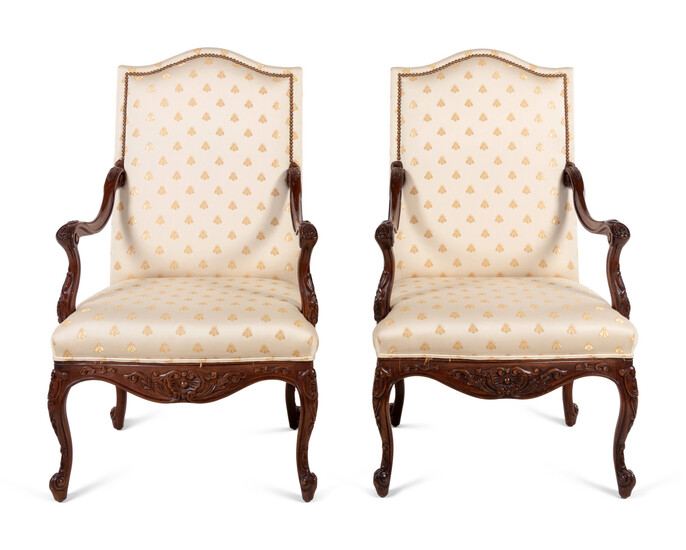 A Pair of Régence Style Walnut Armchairs