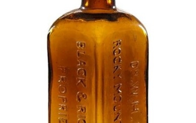 A RARE DR. BLACK'S ROCKY MOUNTAIN BITTERS BOTTLE