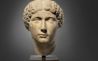 A ROMAN MARBLE PORTRAIT HEAD OF A WOMAN, JULIO-CLAUDIAN PERIOD, CIRCA 1ST CENTURY A.D.